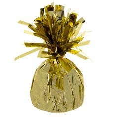 a gold foiled pineapple decoration on a white background