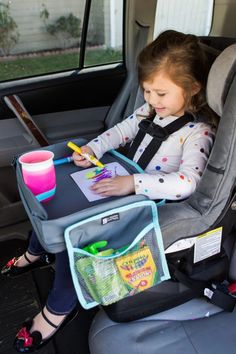 The J.L. Childress 3-IN-1 Travel Tray and Tablet Holder makes road trips, airplane rides and all adventures with kids easier and more fun. This sturdy lap tray features raised edges to keep toys from rolling off and prevents spills. The tray has two detachable mesh pockets that hold snacks, toys and more, and are easil Adventures With Kids, Travel Tray, Car Seat Reviews, Best Car Seats, Car Seat Organizer, Lap Tray, Kid Hacks, Road Trip With Kids, Kids Discover