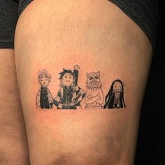 a woman's thigh with three cartoon characters on it