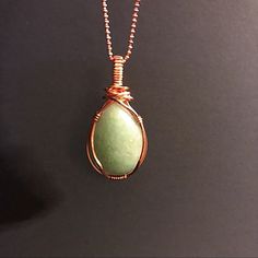 Adele 03 Green Aventurine Teardrop Pendant Hand Wire Wrapped In Copper, Fitted On Diamond-Cut Copper Chain And Finished With A Hand-Forged Copper Clasp. Materials: - Green Teardrop Aventurine Stone - Brushed Copper Wire - Diamond-Cut Copper Chain - Hand-Forged Copper Clasp Measurements: Chain W/ Pendant - Ln 23 In. Pendant - 25 X 18 Mm Color: Green, Copper Note: This Item Is A Natural Material Hand-Crafted With Copper. Because Of The Nature Of The Stone And The Way In Which The Metal Elements We Small Stone Wire Wrapping, Wire Wrapped Rocks, Wire Wrapped Jewelry Beginner, Simple Wire Wrap, Drilling Glass, Rock Tumbling, Copper Chain Necklace, Wire Wrap Cabochon, Wire Wrapped Stone Jewelry