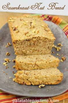 two slices of banana nut bread on a plate with the words, sauerkraut nut bread