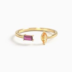 Modern and unconventional, this ring adds sparkle to your ringscape with a playful mix of gemstone shapes and colors. Perfect for everyday wear, this ring is designed for flexibility in fit and features 2x4mm baguette and 5x2.5mm marquise birthstones set in a polished open-cuff ring. Choose in sterling silver, white, yellow or rose gold. Made just for you. Two Birthstone Ring, Gemstone Shapes, Open Cuff Ring, Stacker Rings, Cuff Ring, Cuff Rings, Shapes And Colors, Open Ring, Birthstone Ring