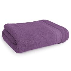 the purple towel is folded on top of each other