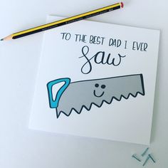 a card with the words to the best dad i ever saw on it next to pencils and crayons