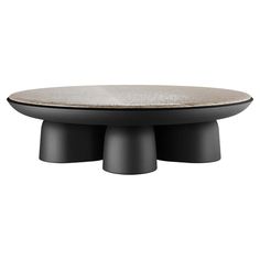 an oval table with two black bases