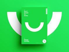 a green book with a smiley face on the front and back cover that says, don't forget to smile