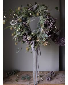 a wreath is sitting on top of a table