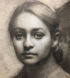 a black and white drawing of a woman's face with her hair pulled back