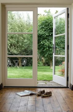 an open door with the words timber windows on it