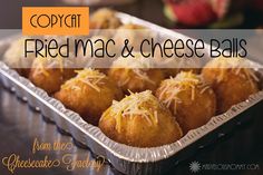 some food is in a metal pan on a table with the words copycat fried mac and cheese balls