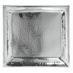 a square silver plate on a white background