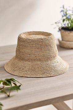 This hand-crocheted raffia bucket hat with a telescope crown adds a twist to a classic sunny day accessory. | Crocheted Raffia Bucket Hat in Beige at Terrain Spring Straw Bucket Hat, Vacation Bucket Hat With Woven Detail, Woven Summer Bucket Hat, Spring Bucket Straw Hat, Casual Straw Bucket Sun Hat, Summer Bucket Hat In Straw, Woven Bucket Hats For Summer, Casual Summer Straw Bucket Hat, Beach Bucket Sun Hat