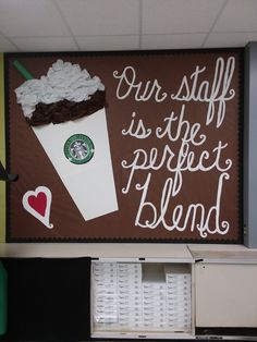 a starbucks sign with the words our staff is the perfect blend in white writing on it