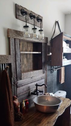 a bathroom with a sink and wooden cabinets