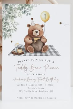 a teddy bear picnic birthday party with balloons