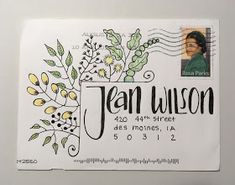 a stamp with the name jean wilson on it and a drawing of a woman's face