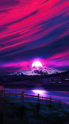 the sun is setting over a mountain range with pink and purple clouds in the sky