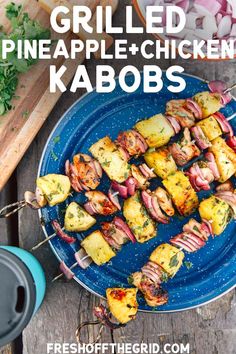 grilled pineapple chicken kabobs on a blue plate with text overlay