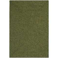 a green rug with an interlocked design