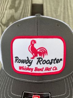 Whiskey Bent Hat Co Rowdy Rooster Grey/White MidPro Mesh Back Adjustable Snapback One Size Fits Most White Country Style Trucker Hat With Curved Brim, Country Style White Snapback Hat, White Country Style Trucker Hat, Country Style White Baseball Cap, White Cap For Rodeo, Country Style White Snapback Trucker Hat, White Adjustable Country Trucker Hat, Adjustable White Country Trucker Hat, Adjustable White Country Style Trucker Hat