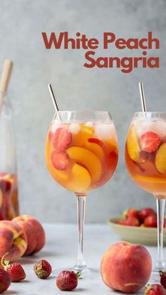 two glasses filled with white peach sangria