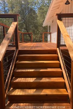 wooden steps leading up to a white house