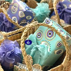 baskets filled with blue and purple items in each one's basket, some are wrapped in twine