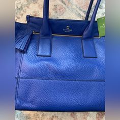 Brand New With Tags! Gorgeous Blue Color. There Is A Faint White Mark In The Backside Of The Bag-See Photos. I Bought It Like This-Haven’t Tried To Get It Out. Questions? Comment Below! Blue Shoulder Bag With Handle Drop For Office, Kate Spade Blue Shoulder Bag For Office, Kate Spade Blue Bag For Office, Blue Kate Spade Bag For Errands, Blue Bags With Gold-tone Hardware For On-the-go, Kate Spade Blue Office Bag, Blue Kate Spade Shoulder Bag For Travel, Blue Kate Spade Tote Bag, Blue Kate Spade Travel Bag