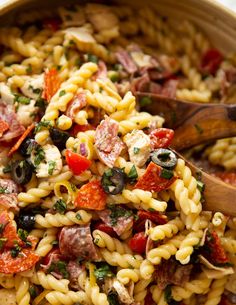 pasta salad with meat and vegetables in a bowl