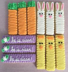 decorated cookies in the shape of carrots and bunnies