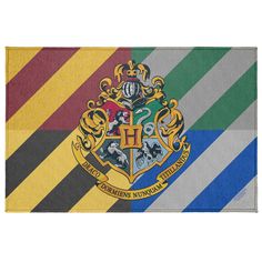 the hogwarts house flag is shown on a striped background with blue, green, yellow and red stripes