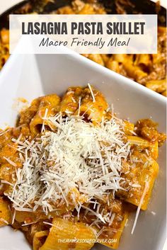 lasagna pasta skillet with parmesan cheese on top in a white bowl