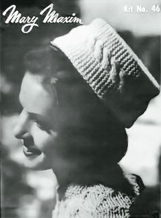 an old photo of a woman wearing a crocheted hat and smiling for the camera