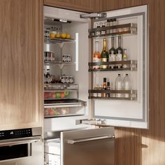 an open refrigerator door with drinks and condiments on the shelves in a kitchen