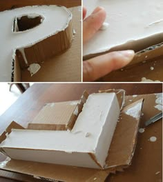 there is a cake that has been cut in half and placed on top of cardboard