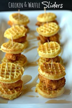 chicken and waffle sliders on a plate with toothpicks in the middle