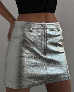 Auriga Metallic Mini Skirt – Baly Shop Spring Stretch Mini Skirt With Pockets, Solid Color Skirt-style Skort For Club, Casual Skort For Club, Casual Solid Color Skort For Club, Solid Color Skort For Club, High Waist Skirt With Pockets For Club, Fitted Club Bottoms With Pockets, Fitted Bottoms With Pockets For Club, Club Mini Skirt With Pockets