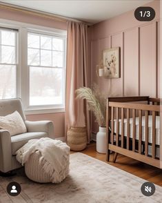 a baby's room is shown with pink walls and white furniture, including a crib