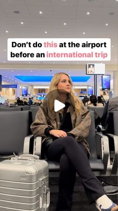 a woman sitting on top of an airport bench next to two suitcases and a sign that says don't do this at the airport before an international trip