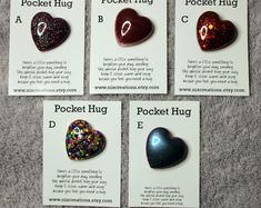 four different types of heart brooches are shown on the carpet with information about them