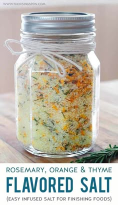 a jar filled with orange and thyme flavored salt