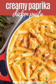 creamy paprika chicken pasta in a red skillet