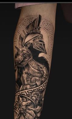 a man's leg with tattoos on it and an image of a person wearing a helmet