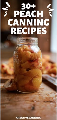 a jar filled with peaches sitting on top of a wooden table next to a knife