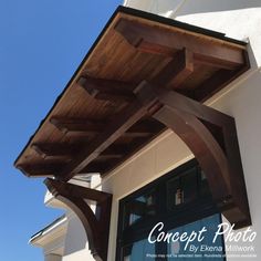 a wooden awning on the side of a building