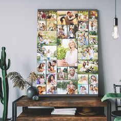 a collage of photos is displayed on a wall above a wooden table in front of a cactus