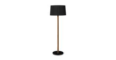 a floor lamp with a black shade on the top and a wooden pole underneath it