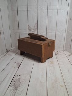 This retro shoe shine box opens to a compartment for shoe polish, cloth, and brush storage. This item is vintage and shows some signs of age.  The kit has one large interior compartment to hold brushes and shoe shine accessories and a shoe rest carry handle to readily move the box from storage to use. The interior of the box is dusty and dirty. Mcm Shoes, Shoe Shine Box, Lexington Nc, Accessory Storage, Brush Storage, Vintage Shoe, Shoe Polish, Shoe Shine, Retro Shoes