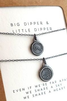 two little silver necklaces on a card that says, big dipper & little dipper