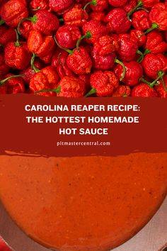 a bowl full of hot sauce with strawberries in the background and text overlay that reads, carolina reaper recipe the hotest homemade hot sauce